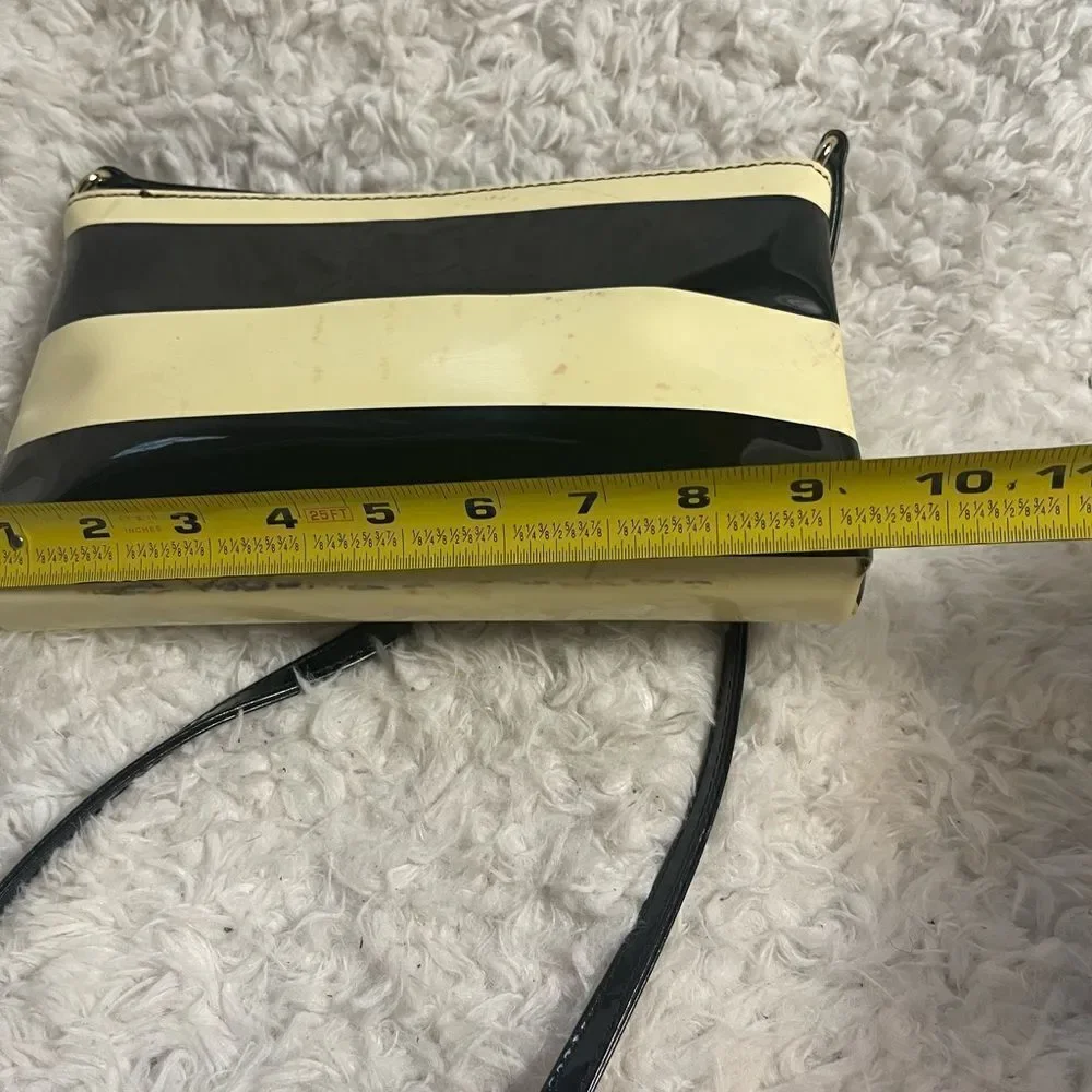 Kate Spade patent Black and Cream Striped small Crossbody Bag.